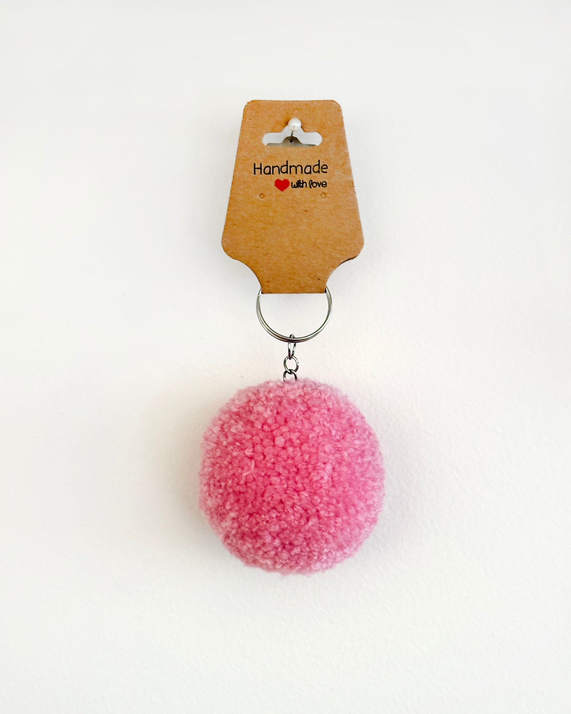 Pom pom obesek roza barve
